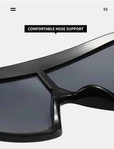 Detail of comfortable integrated nose support on oversized black fashion sunglasses