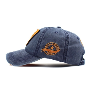 Navy blue washed cotton baseball cap with vintage distressed edges and 3D embroidery