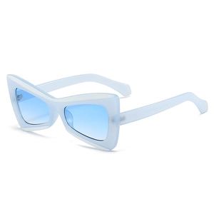 Chic cat eye sunglasses with light blue translucent frames and gradient lenses