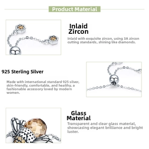 Detailed macro view of 925 sterling silver bee jewelry with 3A cubic zirconia and glass