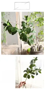 Detailed view of dense dark green artificial Milan leaves for home and wedding decor