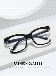 Detail of fashion black and gold square glasses frames with metal corner accents