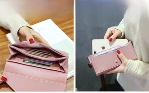 Detail of pink PU leather long wallet showing multi-card slots and phone storage capacity