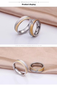 Detail of matte frosted gold and silver dual-tone rings with embedded zircon stones