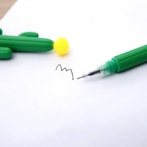 Creative green cactus gel pen with yellow cap writing smooth black ink lines on paper