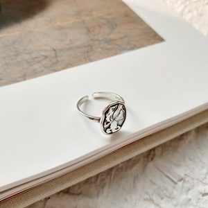 Macro shot of S925 sterling silver vintage portrait relief ring with S925 hallmark