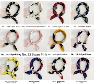 Macro display of 12 printed silk scarves featuring diverse patterns and vibrant colors