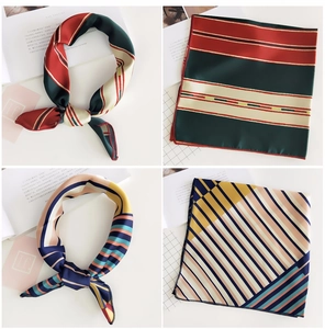 Detailed views of geometric striped silk scarves with satin texture and elegant patterns
