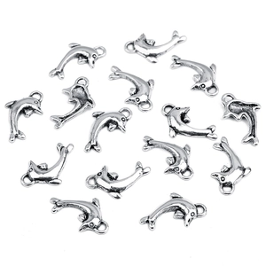 Detailed view of silver dolphin alloy pendants for DIY bracelet jewelry making