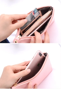 Pink faux leather wallet showing internal card slots and large phone compartment