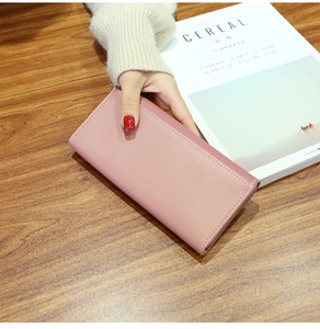 Sleek mauve pink faux leather long wallet for women with minimalist stitching and slim profile