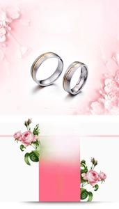 Close-up of titanium steel couple rings with gold inlay and three inlaid diamonds