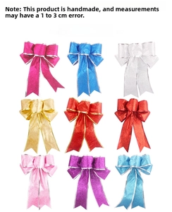 Close-up of 25cm glitter Christmas bows in nine colors with decorative silver and gold edges