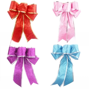 Detailed grid view of 25cm glitter Christmas bows in red, pink, purple and blue for DIY decor