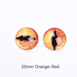 Detailed view of 20mm orange-red dragon glass eyes for DIY jewelry and crafts
