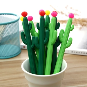 Creative cactus gel pens with colorful flower tops in a stylish white ceramic holder