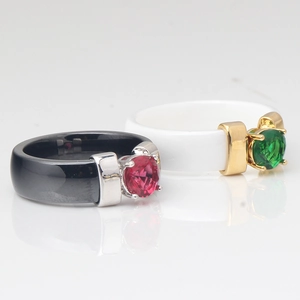 Macro shot of 6mm ceramic rings with cubic zirconia inlay in black and white styles