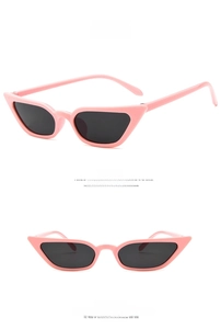 Pink cat-eye sunglasses with dark grey lenses shown from front and side angles