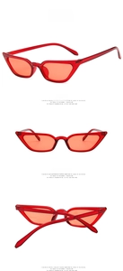 Detailed views of red transparent cat-eye sunglasses with retro small frames and tinted lenses