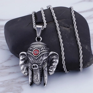 Silver elephant head pendant with red gemstone on a twisted chain for men