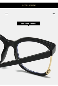 Macro detail of chic black and gold eyewear frame featuring premium metal hinges