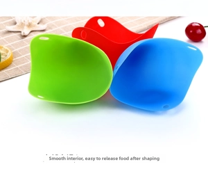 Close-up of flexible silicone egg poacher set showing smooth interior for easy demolding