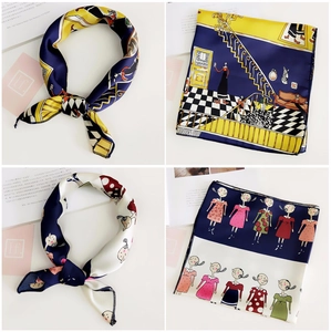 Detail of silk-feel square scarf featuring artistic portraits and geometric interior patterns