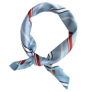 Blue satin silk square scarf with red and white diagonal stripes tied in a stylish knot