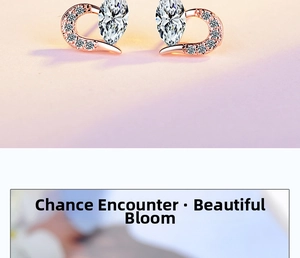 Macro shot of rose gold heart stud earrings featuring marquise-cut stones and pavé diamonds