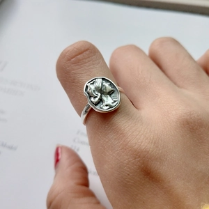 Retro 925 sterling silver ring with vintage portrait relief and minimalist band design