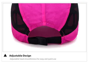 Detail view of adjustable back strap with plastic buckle on a pink mesh sports cap