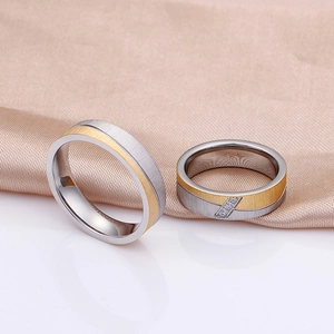 Frosted titanium steel couple rings with diamonds on silk and reflective base