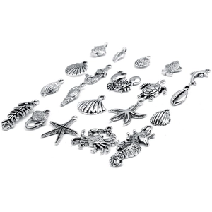 Bulk set of silver ocean themed metal pendants including starfish and shells for DIY jewelry