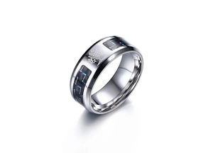 Close-up of 8mm stainless steel ring with blue black carbon fiber and tree of life pattern