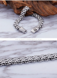 Detail of braided stainless steel men's bracelet with magnetic clasp and polished finish