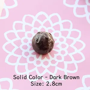Detailed macro view of 2.8cm deep brown chocolate-style resin accessory for DIY crafts