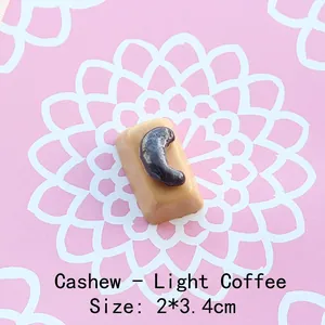 Detailed view of light brown resin cashew chocolate charm for DIY crafts, size 2x3.4cm