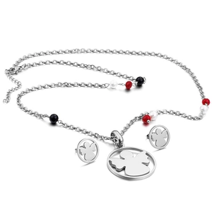 Titanium steel jewelry set with angel charms and red black white beads on white background