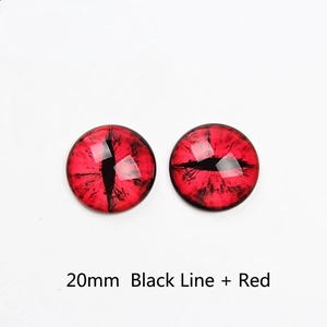 Macro detail of 20mm clear glass eye cabochons with red pattern and black pupils