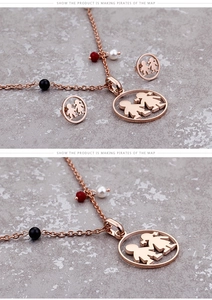 Detail of rose gold jewelry set with boy-girl silhouette pendants and colored beads