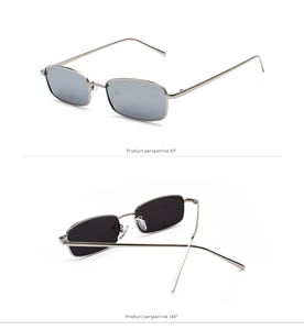 Detalle de gafas de sol cuadradas de metal plateado con ángulos de 90 y 180 grados