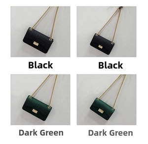 Detail view of mini matte V-pattern jelly bags in black and dark green with chain straps