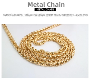 Close-up of premium gold woven metal chain strap with a polished finish for handbags