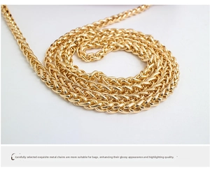 Close-up of premium champagne gold braided metal chain strap for fashion shoulder bags