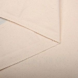 Close-up of canvas Christmas gift bag fabric texture and durable overlock stitching