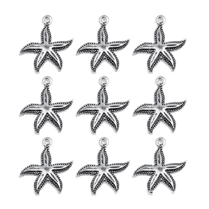 Detailed view of nine silver starfish alloy pendants for DIY jewelry and bracelets