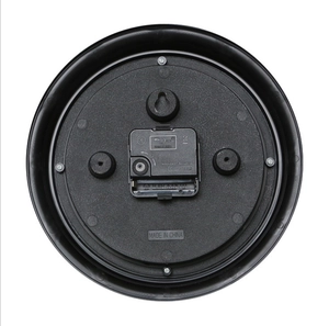 Rear view of 9-inch silent plastic wall clock showing quartz movement and battery slot