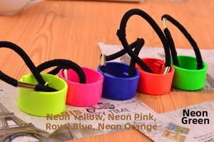 Macro detail of high-elasticity hair ties with colorful neon matte decorative buckles