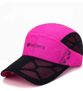 Close-up of pink and black mesh sports cap with breathable net and star logo