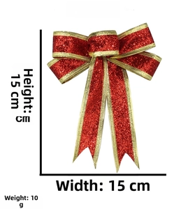 Detailed view of a 15cm red glitter Christmas bow with gold trim on a white background